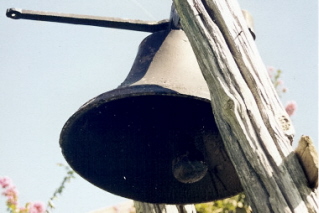 Ralph Stancil, son of George Ira, with George Ira's Bell.