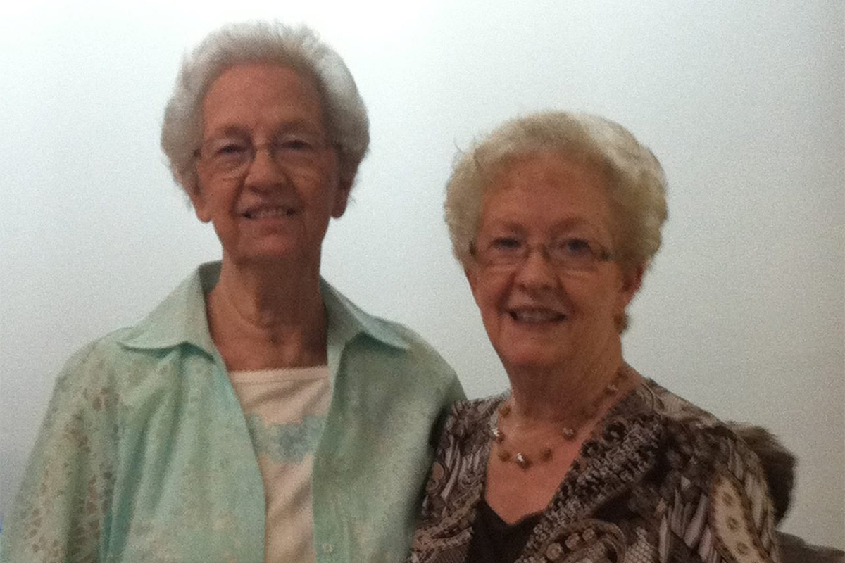 Josephine Hill Parrish celebrates her 75th birthday with her sister Jeri Hill Lewis in 2014.