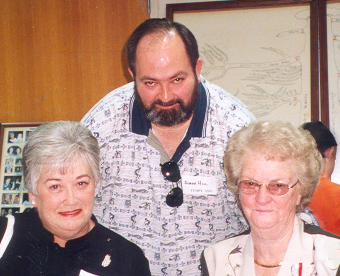 Pat Narron, right, visits with Margaret Pope Hill and her son Joseph Hill at the 2001 Stancil Family Reunion in Kenly, North Carolina.